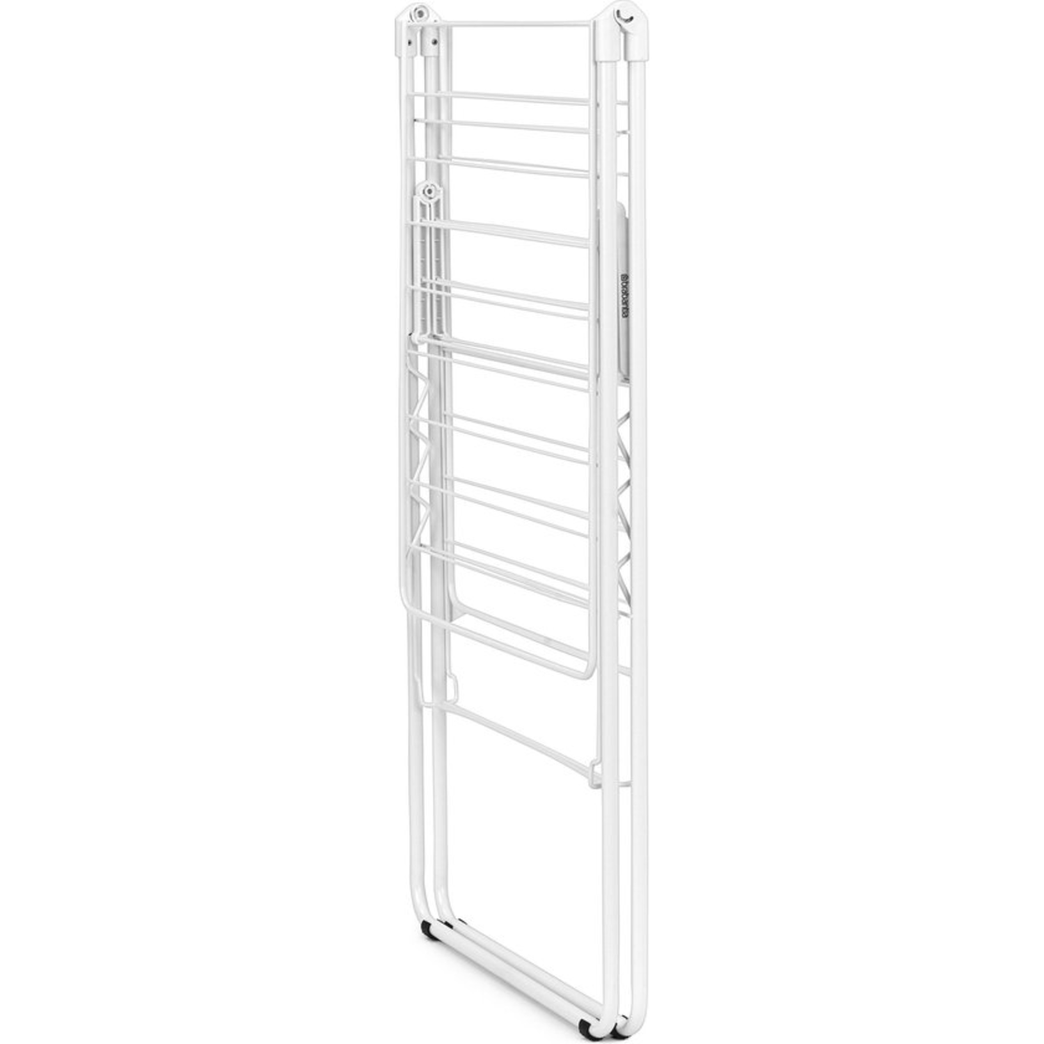 The white drying rack is folded, showing a compact, vertical profile.
