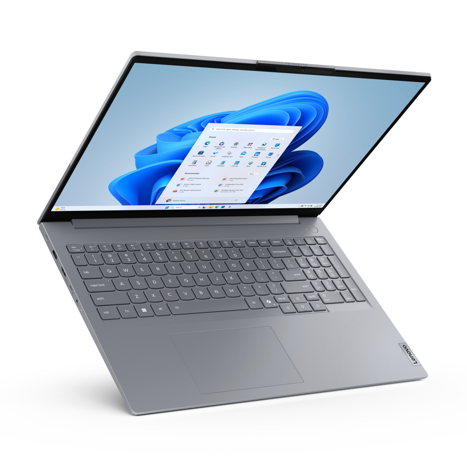 Open grijze laptop met Windows 11 interface, schuine weergave op zwarte achtergrond.