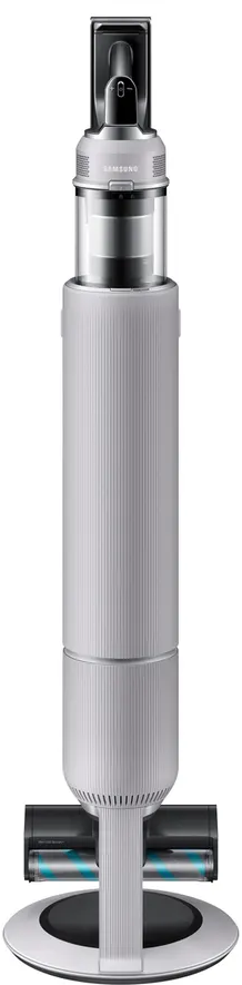 Aspirateur vertical, vue de face. Corps blanc, avec une tête de nettoyage et une base de chargement.