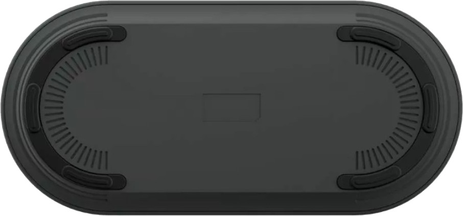 Czarny głośnik Philips. Widok od spodu pokazuje rowki i gumowe nóżki.