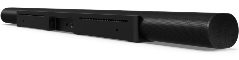 Czarny soundbar, widok z tyłu, z portami i osprzętem montażowym.