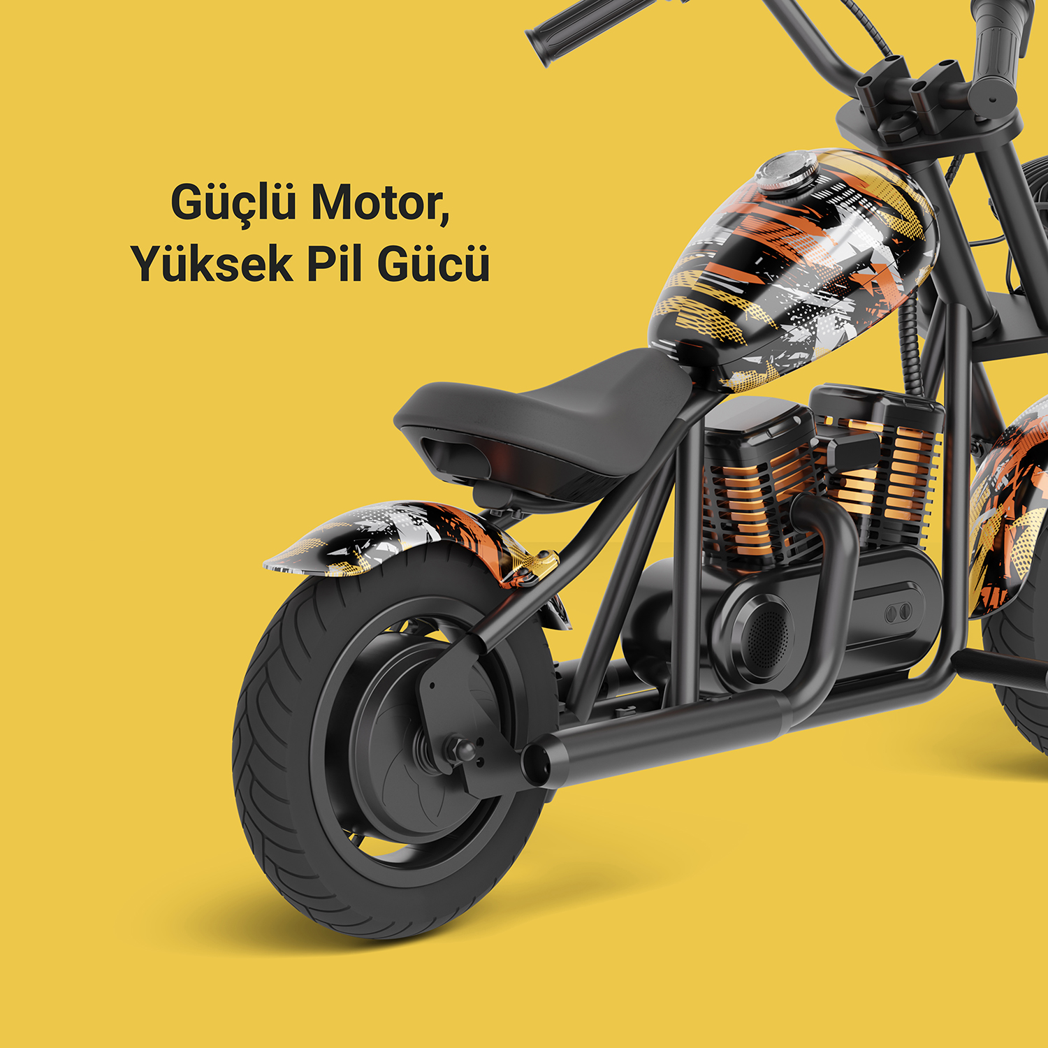 Mini motosikletin yakın çekimi, sarı zemin, siyah ve turuncu tasarım.