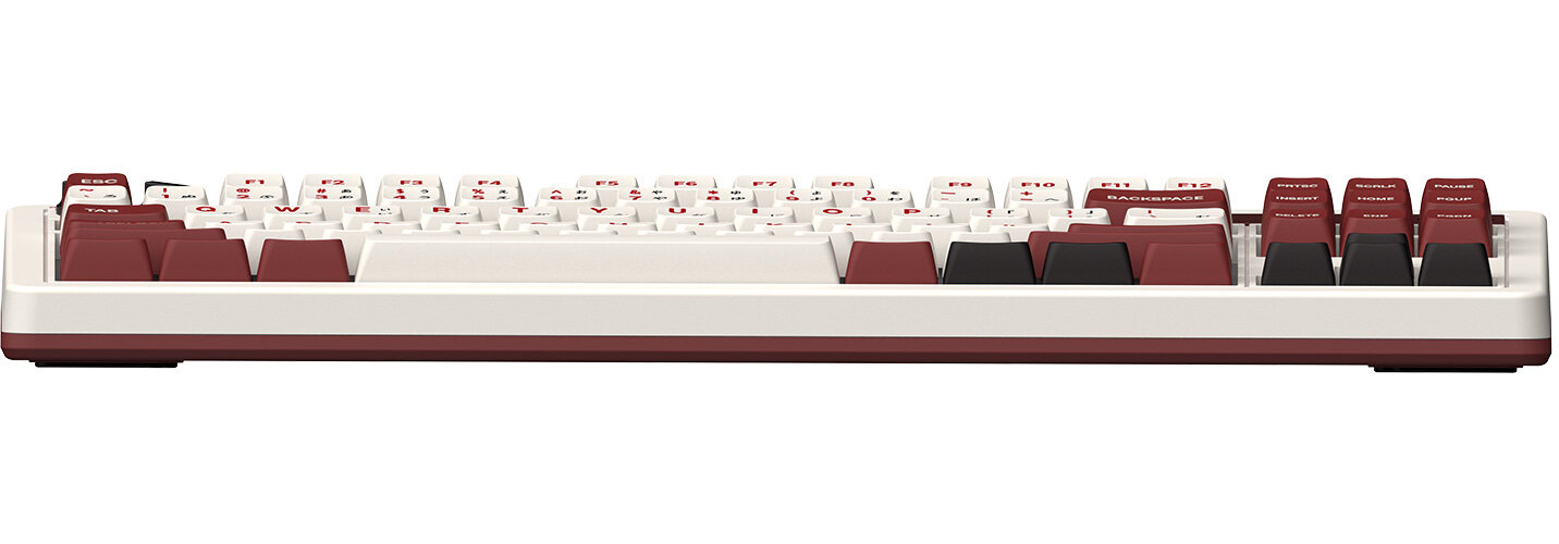 Widok z przodu klawiatury retro. Bordowe klawisze, biała rama. Klawisze funkcyjne i literowe.