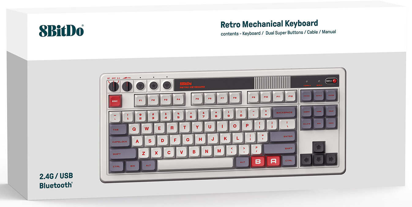 Pudełko klawiatury mechanicznej retro. Klawiatura jest biała z czerwonymi klawiszami. Pudełko jest białe.