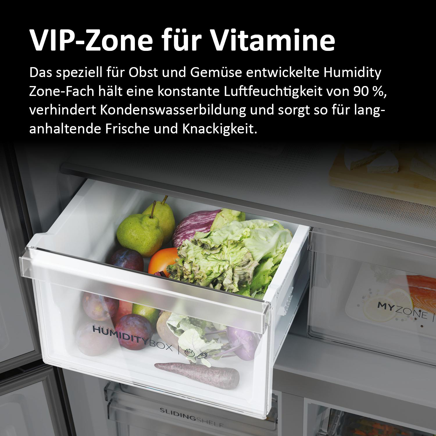 Kühlschrankinnenraum. Die Feuchtigkeitsbox mit Obst und Gemüse.