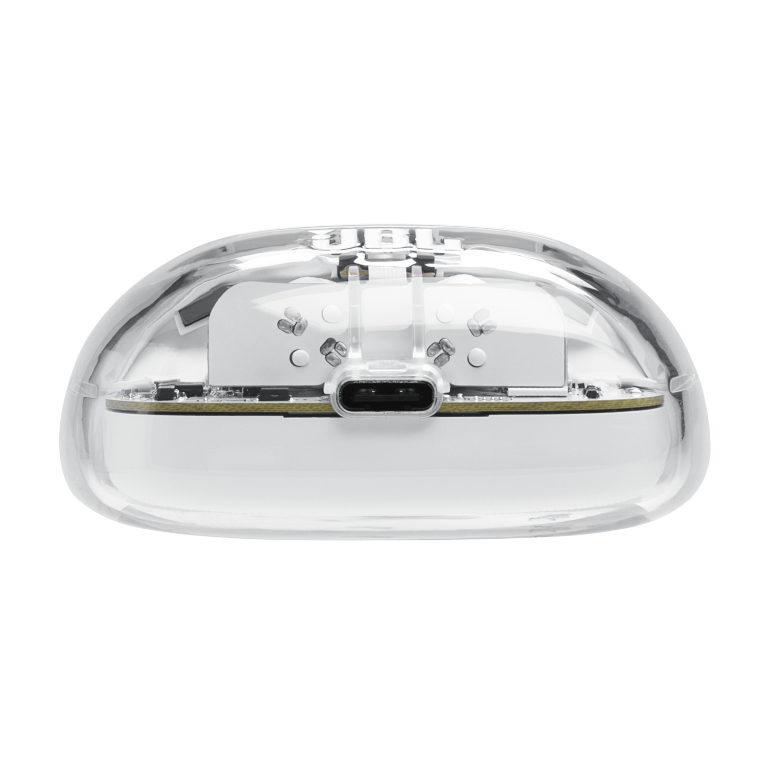 Étui d'écouteurs JBL transparent, montrant le port de charge. Intérieur blanc, fond noir.