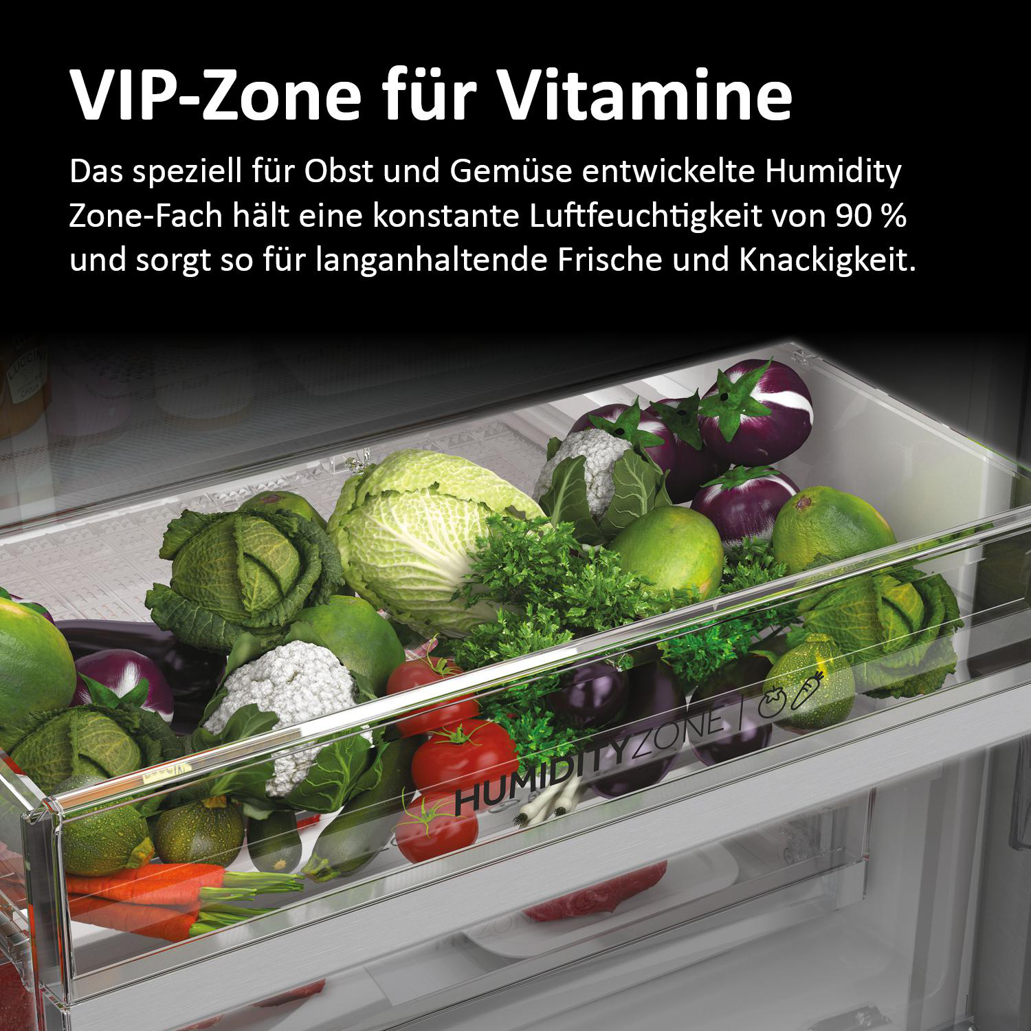 Haier Kühlschrank-Innenraum. Humidity Zone Schublade mit Gemüse.