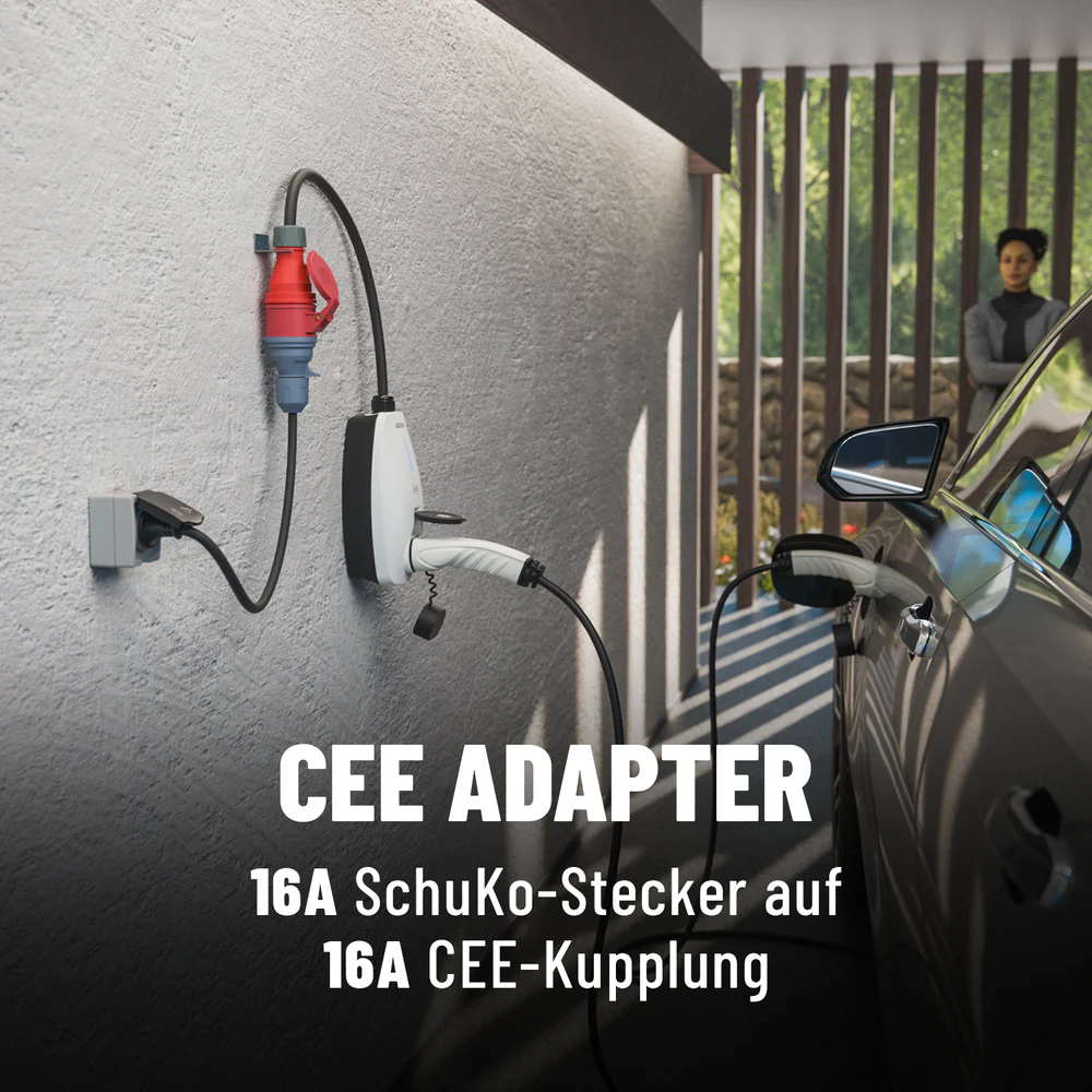 Egy falhoz csatlakoztatott adapter, háttérben egy autóval és egy nővel.