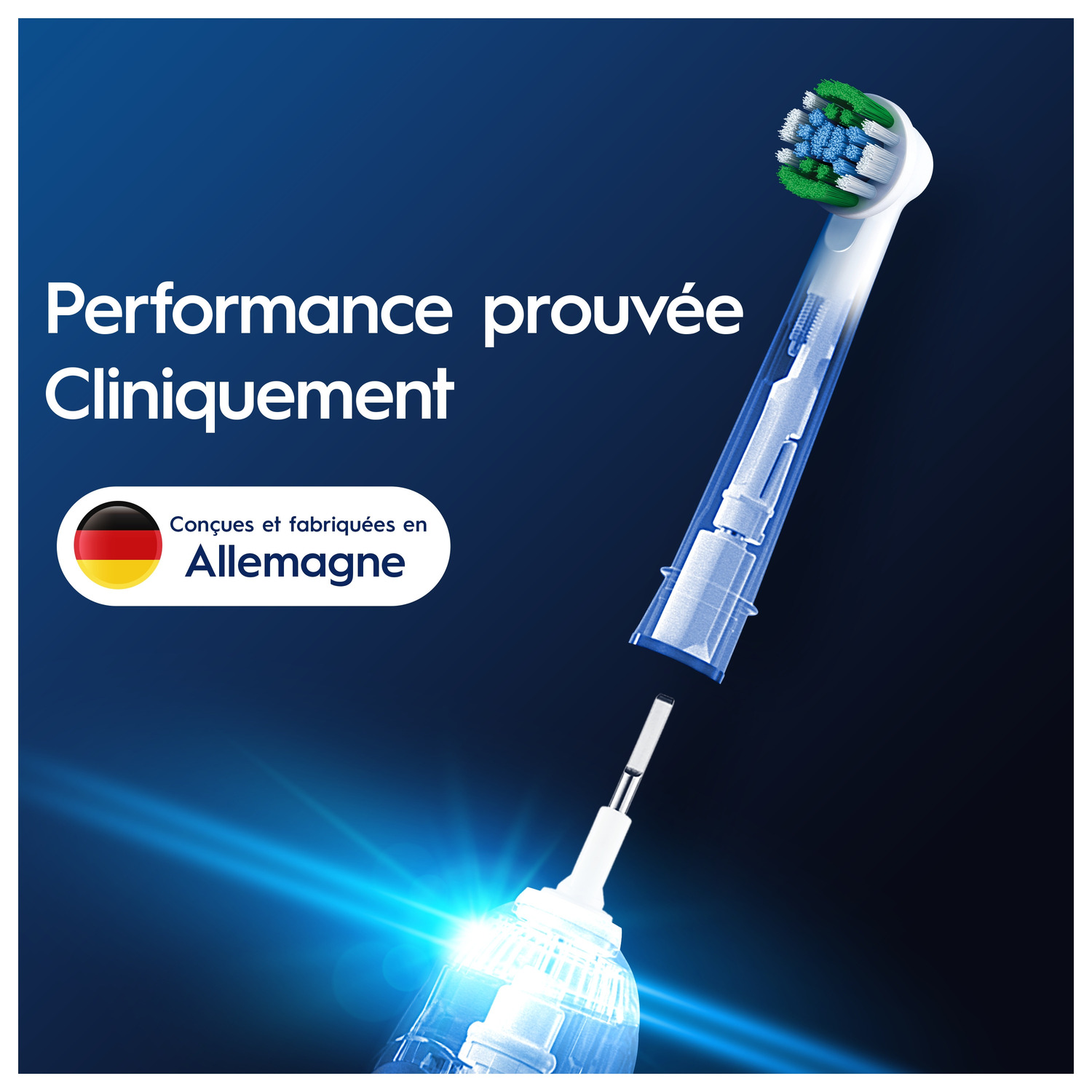 Tête de brosse à dents. Montre les parties internes. Fabriqué en Allemagne. Fond bleu.