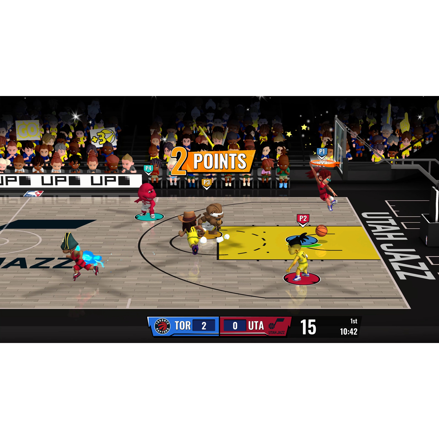 Basketball game in progress. Players in action, scoreboard visible, cheering crowd in background.