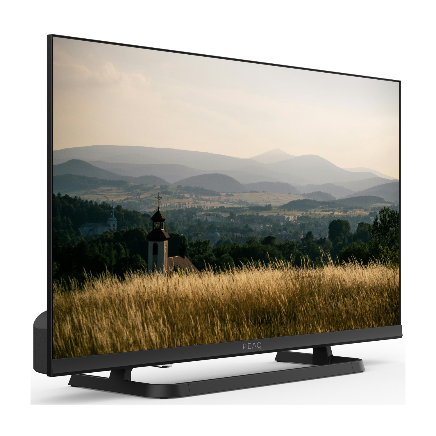 TV PEAQ, vista di un paesaggio con campo e montagne. Cornice nera, supporto nero. Chiesa sullo sfondo.