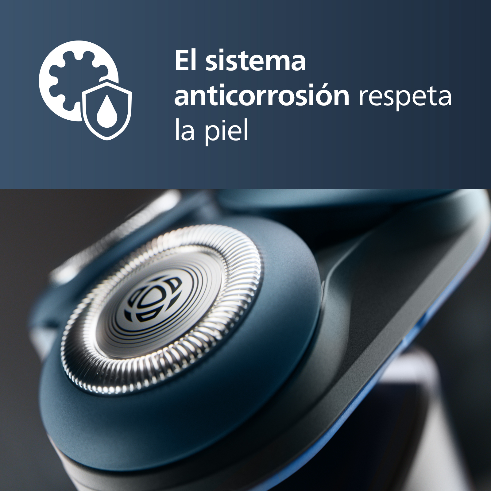 Primer plano de un cabezal de afeitadora eléctrica azul y plateada. Texto en español: 'El sistema anticorrosión respeta la piel'.