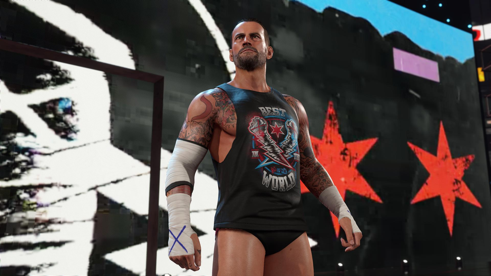 Wrestler mit Tattoos im Ring. 'BEST IN THE WORLD' auf Weste. Roter und gelber Hintergrund.