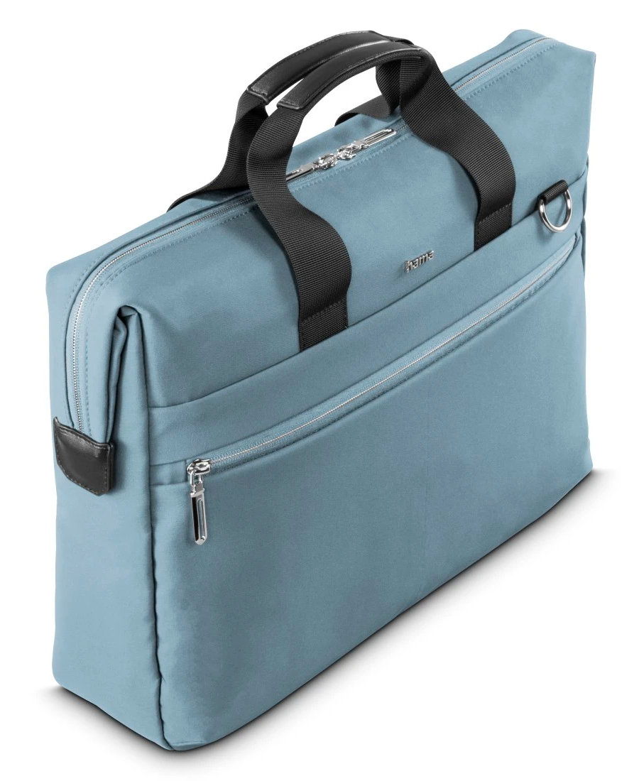 Niebieska teczka Hama, widok pod kątem. Posiada uchwyt, srebrne zamki i D-ring z boku.