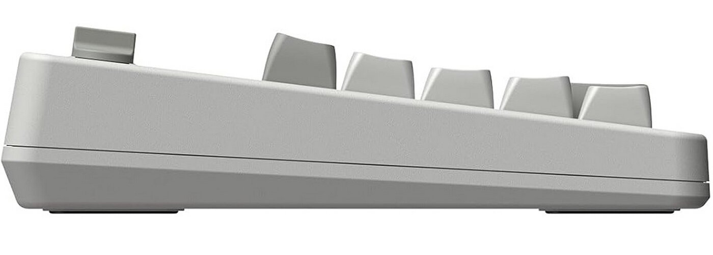 Widok z boku szarej klawiatury. Pokazuje szare klawisze i profil boczny klawiatury. Klawisze są jasnoszare.