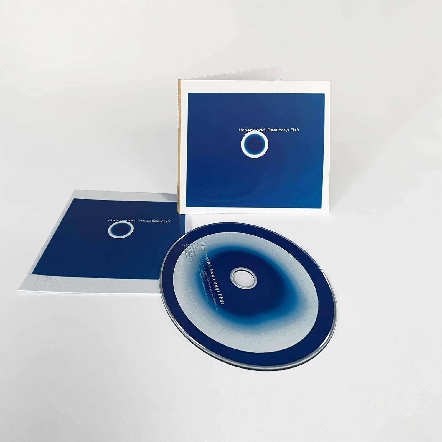 CD case and disc with artwork of a blue circle on a blue background, text reads: "Underworld, Beaucoup Fish."