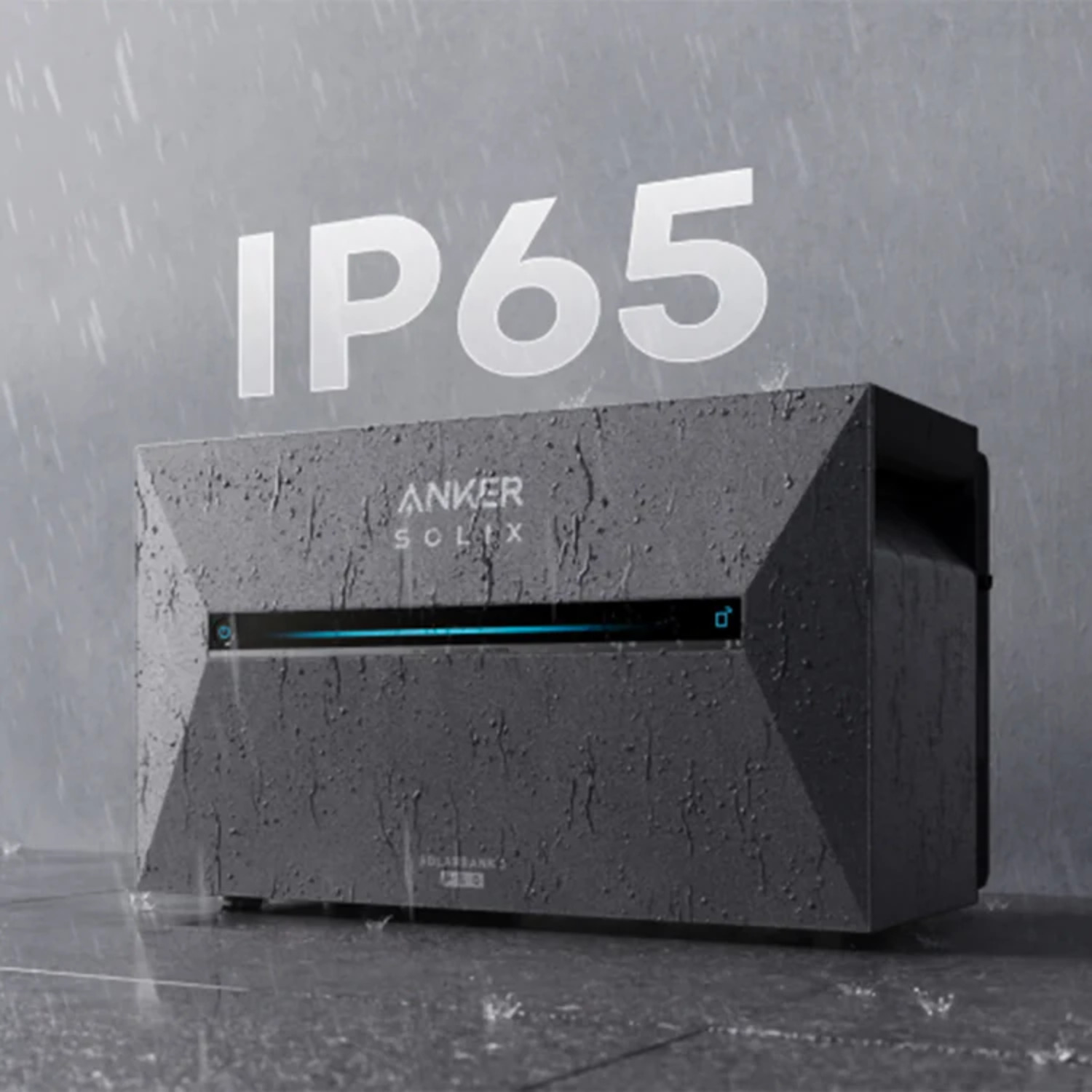 A grey Anker Solix power station in the rain. Text reads IP65. Surface is wet, with water droplets. The background is grey.