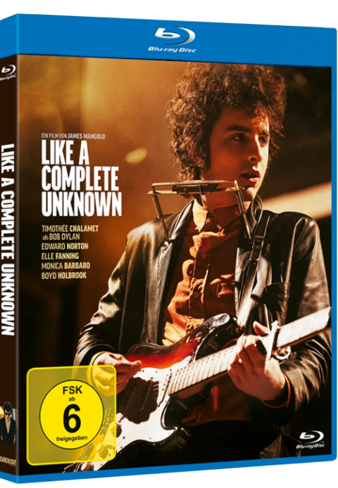 Filmcover: Ein Mann spielt Gitarre und Mundharmonika.