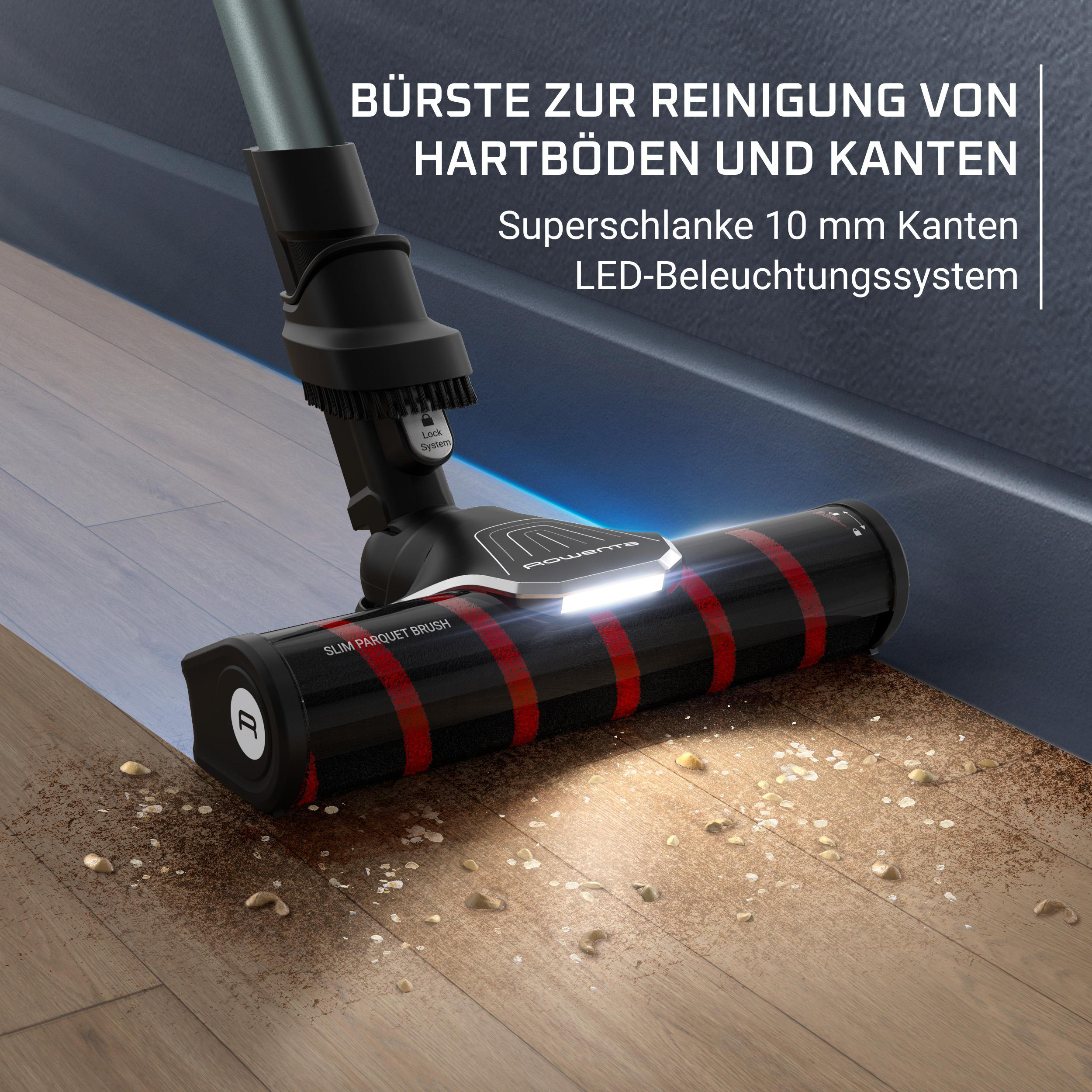 Nahaufnahme des Staubsaugerkopfes, der einen Holzboden reinigt. Die Bürste ist rot mit einem Licht.