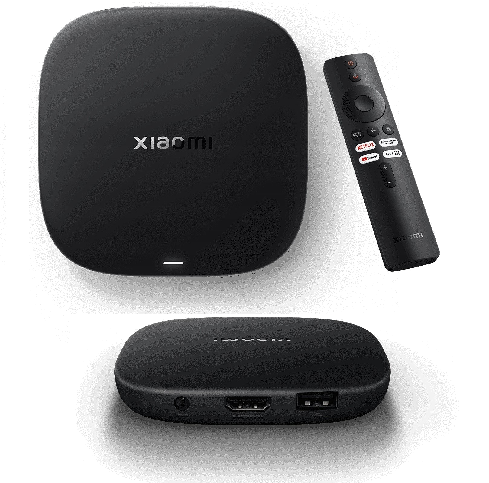 Czarny Xiaomi TV box i pilot. Box z logo. Pilot z przyciskami aplikacji.