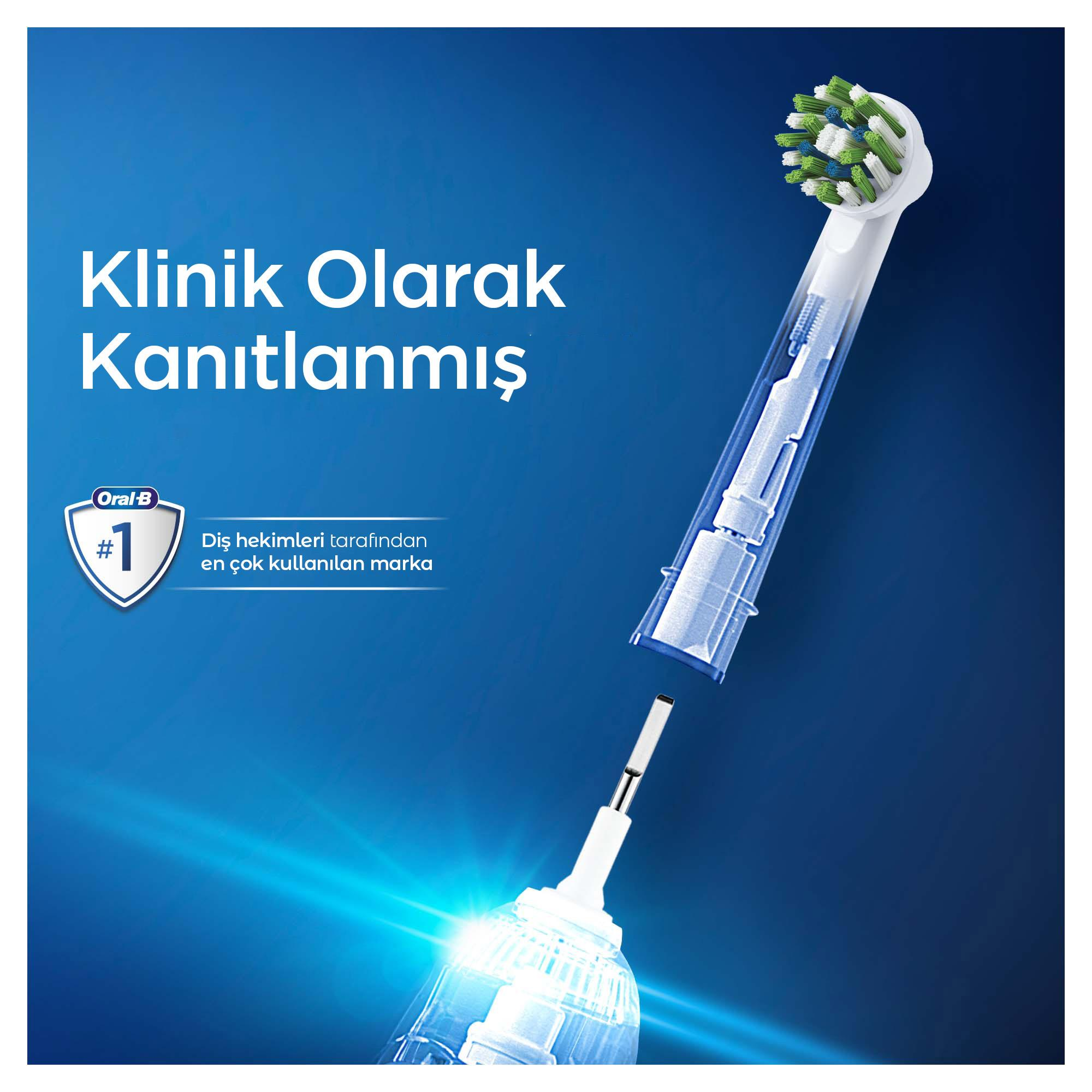 Bir Oral-B diş fırçası başlığı ve sapı. Başlıkta yeşil ve beyaz kıllar var. Metin içeren mavi arka plan.