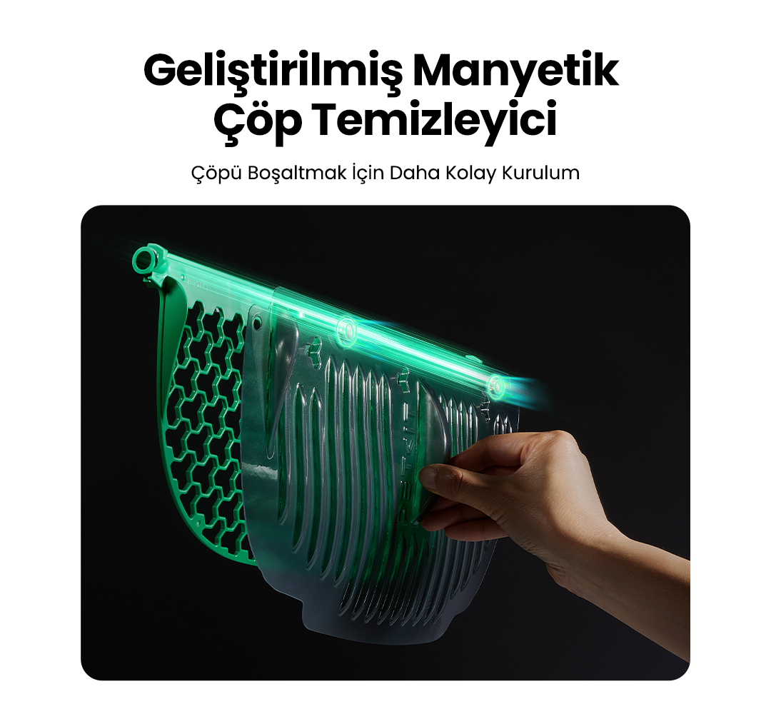 Yeşil bir manyetik çöp temizleyici, onu manipüle eden bir el ile gösteriliyor. Üstte Türkçe metin. Karanlık arka plan.