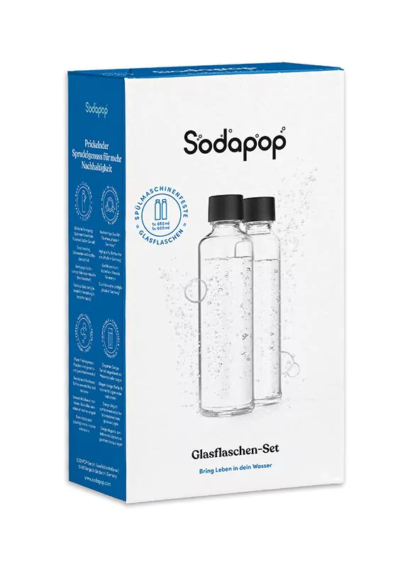 Egy fehér doboz, két üvegpalackkal és fekete tetővel. A dobozon a Sodapop márkanév látható.