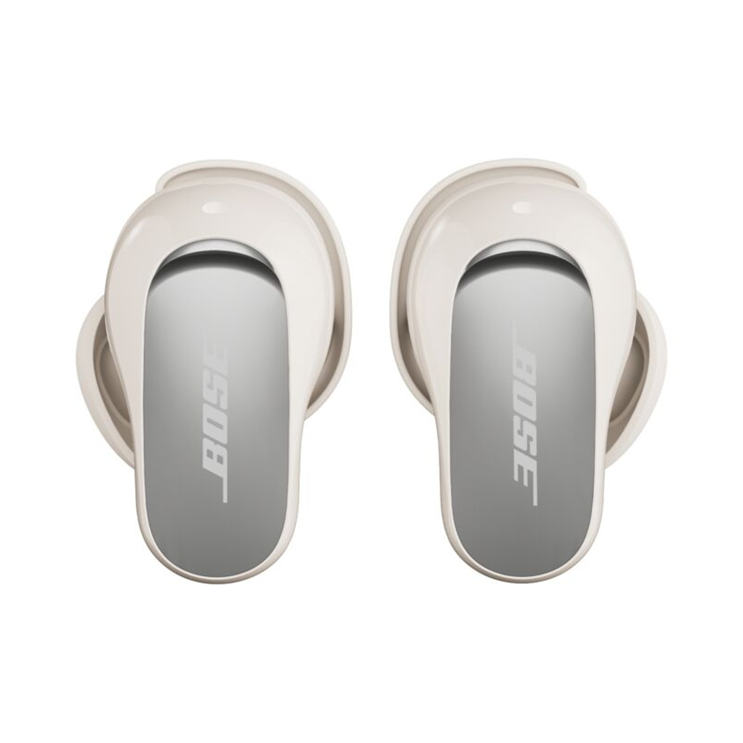 Due auricolari Bose beige. Ognuno ha un centro argentato con il logo Bose. Sfondo bianco.