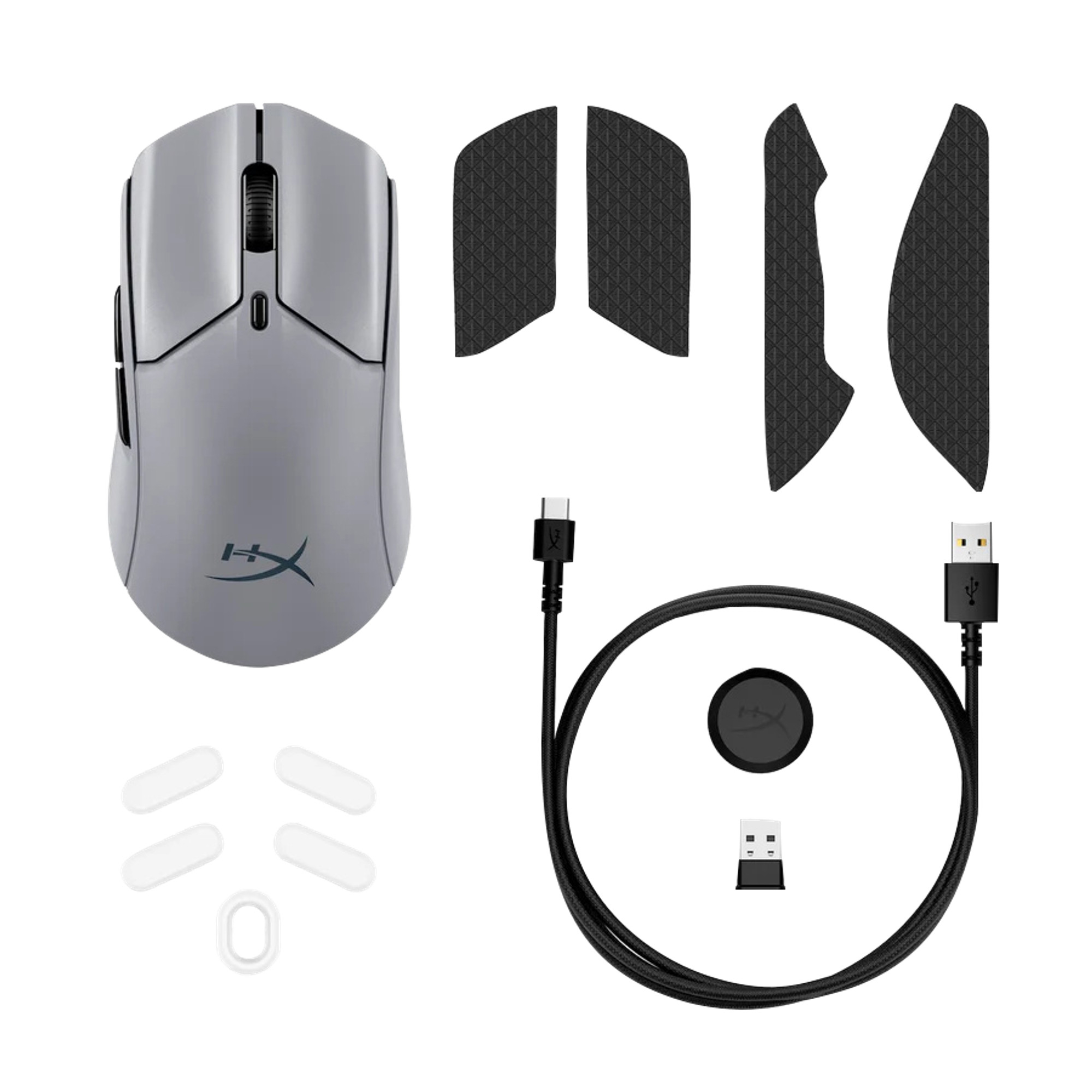 A gray HyperX gaming mouse with accessories: grip tapes, USB cable, USB receiver, and replacement pads.