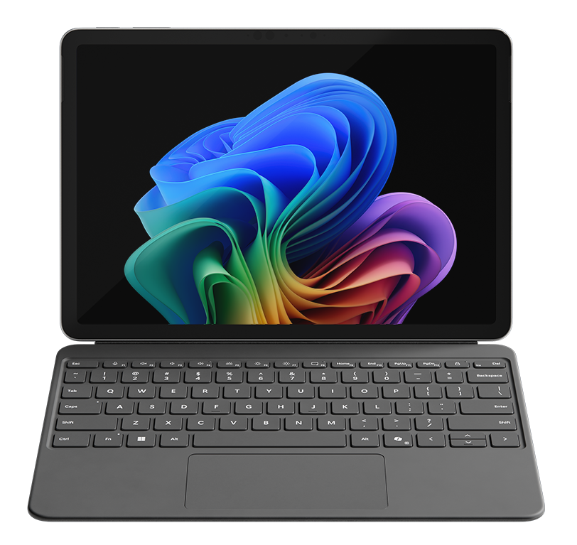 Laptop z klawiaturą i ekranem wyświetlającym abstrakcyjny, kolorowy wzór na czarnym tle.