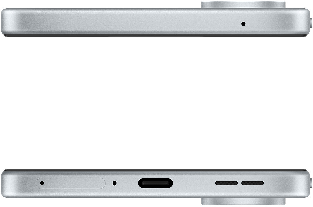 Widoczne są górna i dolna krawędź srebrnego telefonu. Posiada wypukłość aparatu, otwór na mikrofon, port ładowania i otwory głośnikowe.