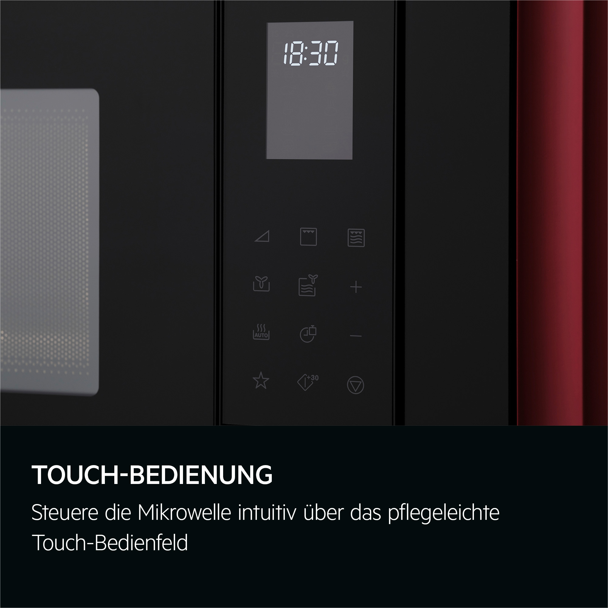 Nahaufnahme eines Mikrowellenbedienfelds mit Zeitanzeige und Touch-Bedienelementen. Schwarze und rote Akzente.