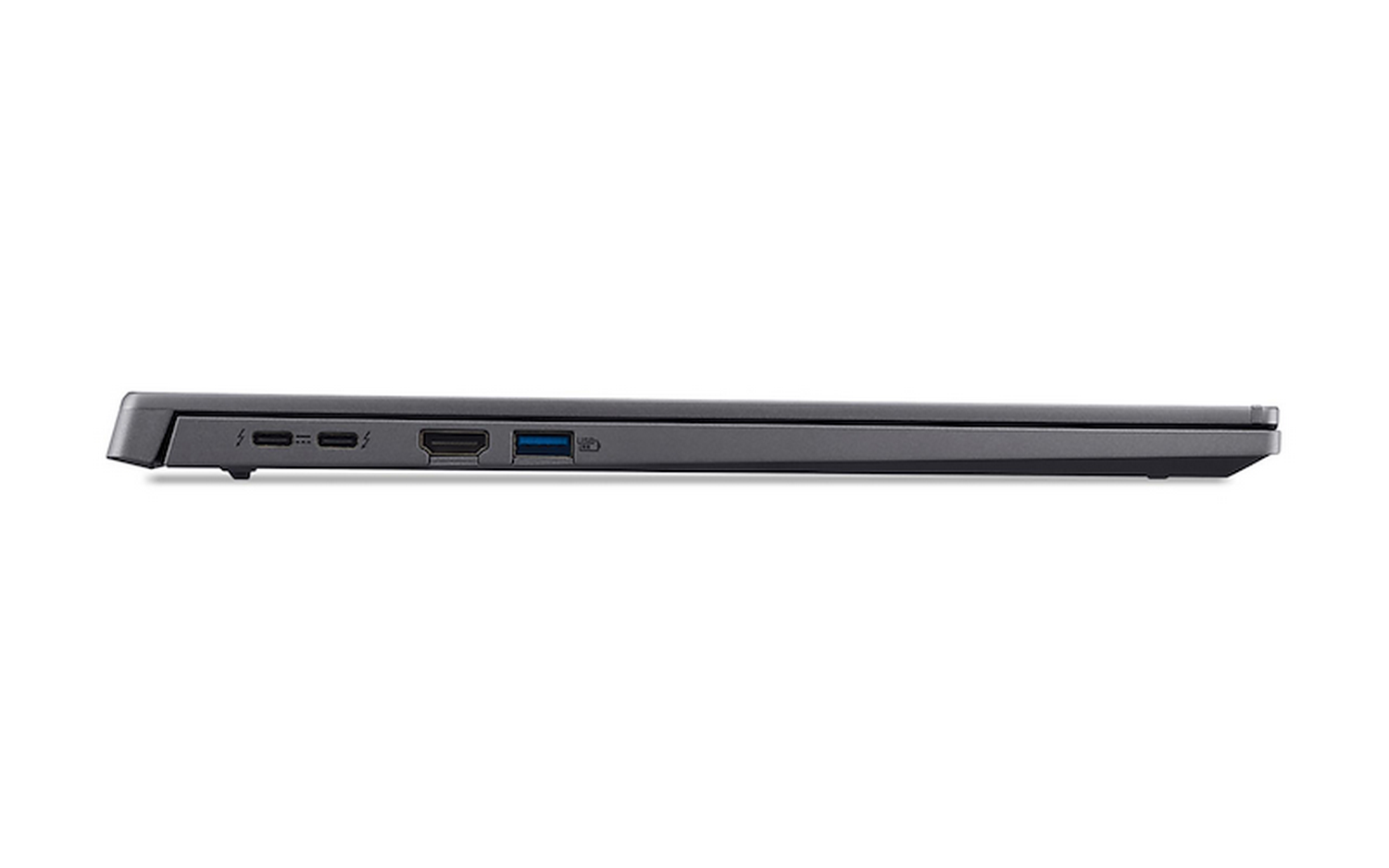 Vista lateral de un portátil gris cerrado. Los puertos incluyen HDMI, USB y puertos de carga. Fondo blanco.