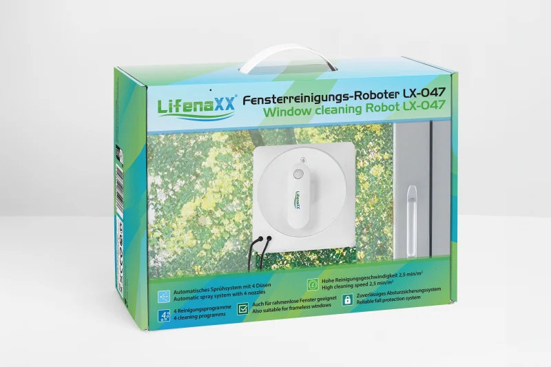 Pudełko z robotem do czyszczenia okien. Tekst po angielsku i niemiecku. W tle okno z zielenią.