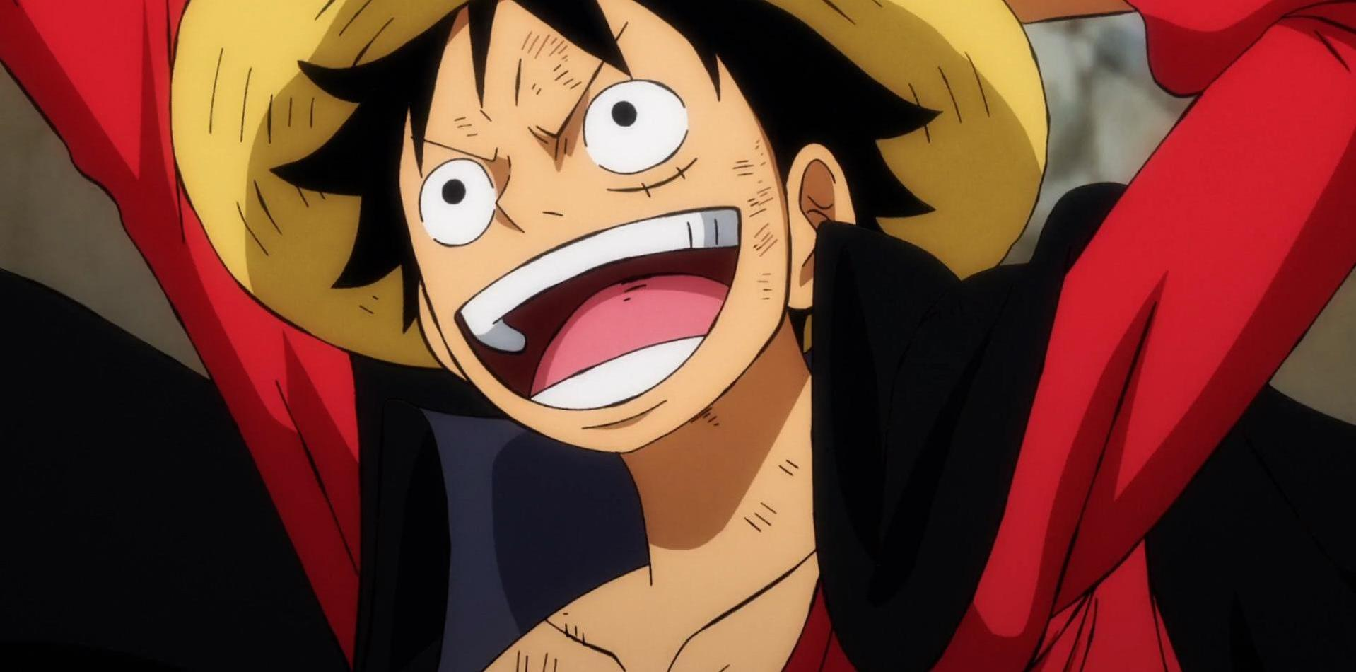 Anime-Figur Luffy mit Strohhut, rotem Hemd und schwarzer Jacke. Er lächelt breit mit offenem Mund.