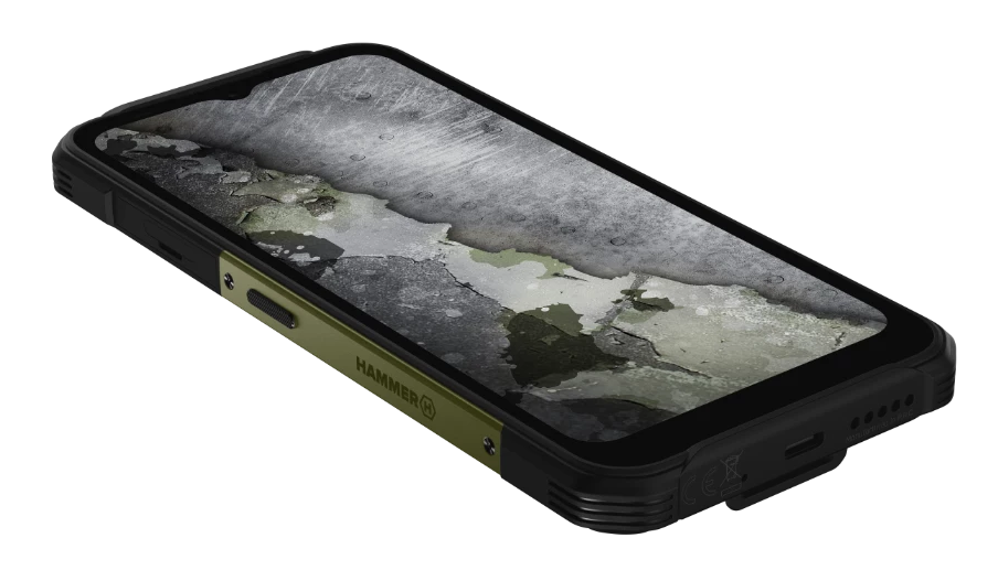 Wytrzymały smartfon z pękniętym betonowym ekranem, oliwkowym bokiem, czarną ramką i czarnym tłem.