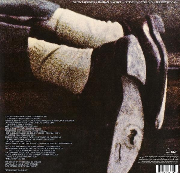Nahaufnahme des Albumcovers. Ein Graustufenfoto einer Hand und einer verschwommenen, strukturierten Oberfläche. Album-Credits unten.