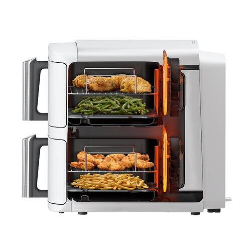 Biały piekarnik z dwiema komorami. Góra: kurczak, fasolka szparagowa. Dół: smażony kurczak, frytki. Widoczne pomarańczowe światło.