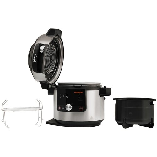 Multicooker Ninja z otwartą pokrywą, pokazujący element grzejny. Zawiera stojak i czarny garnek, wszystko na białym tle.