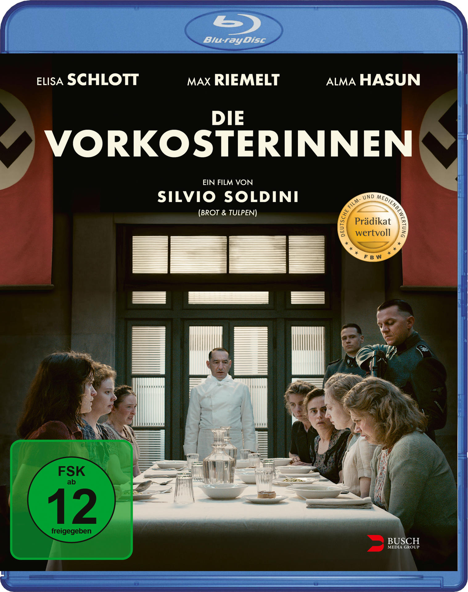 Blu-ray-Cover. Titel: Die Vorkosterinnen. Schauspieler und Crew werden gezeigt. Eine Gruppe von Frauen sitzt an einem Tisch.