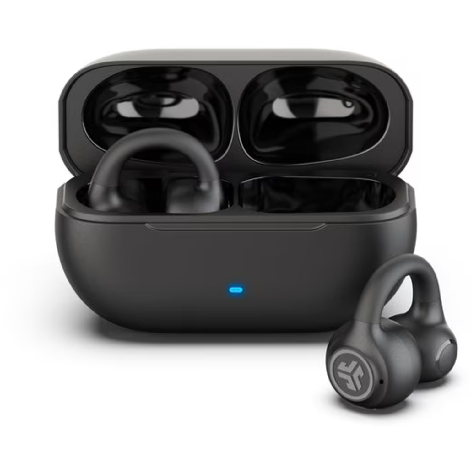 Black earbuds and charging case on white. One earbud is outside the case. Blue light on the case indicates charging.