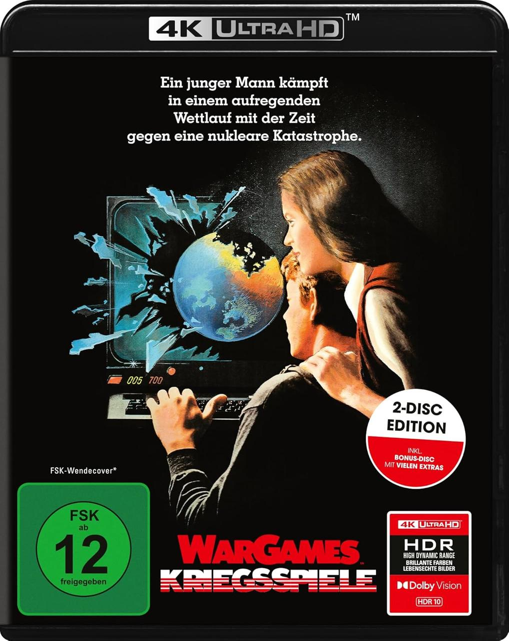Wargames-Filmcover. Ein Mann und eine Frau schauen auf einen Bildschirm. Globus, Text und Logos sind sichtbar.