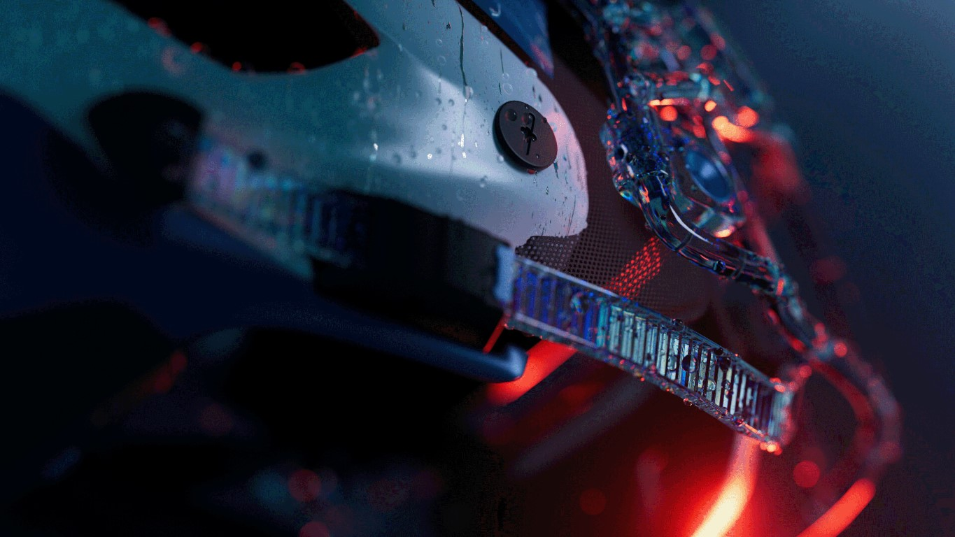 Zbliżenie futurystycznego hełmu z kroplami wody. Zawiera czarny guzik i przezroczysty wizjer z niebieskimi i czerwonymi odcieniami.