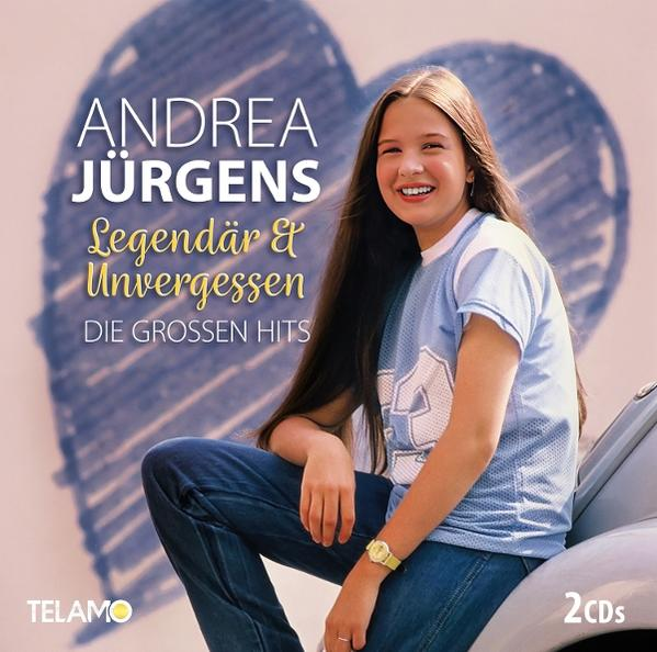 Albumcover von Andrea Jürgens. Sie sitzt auf einem Auto, trägt ein blaues Hemd und Jeans und lächelt. Hintergrund hat eine Herzform.