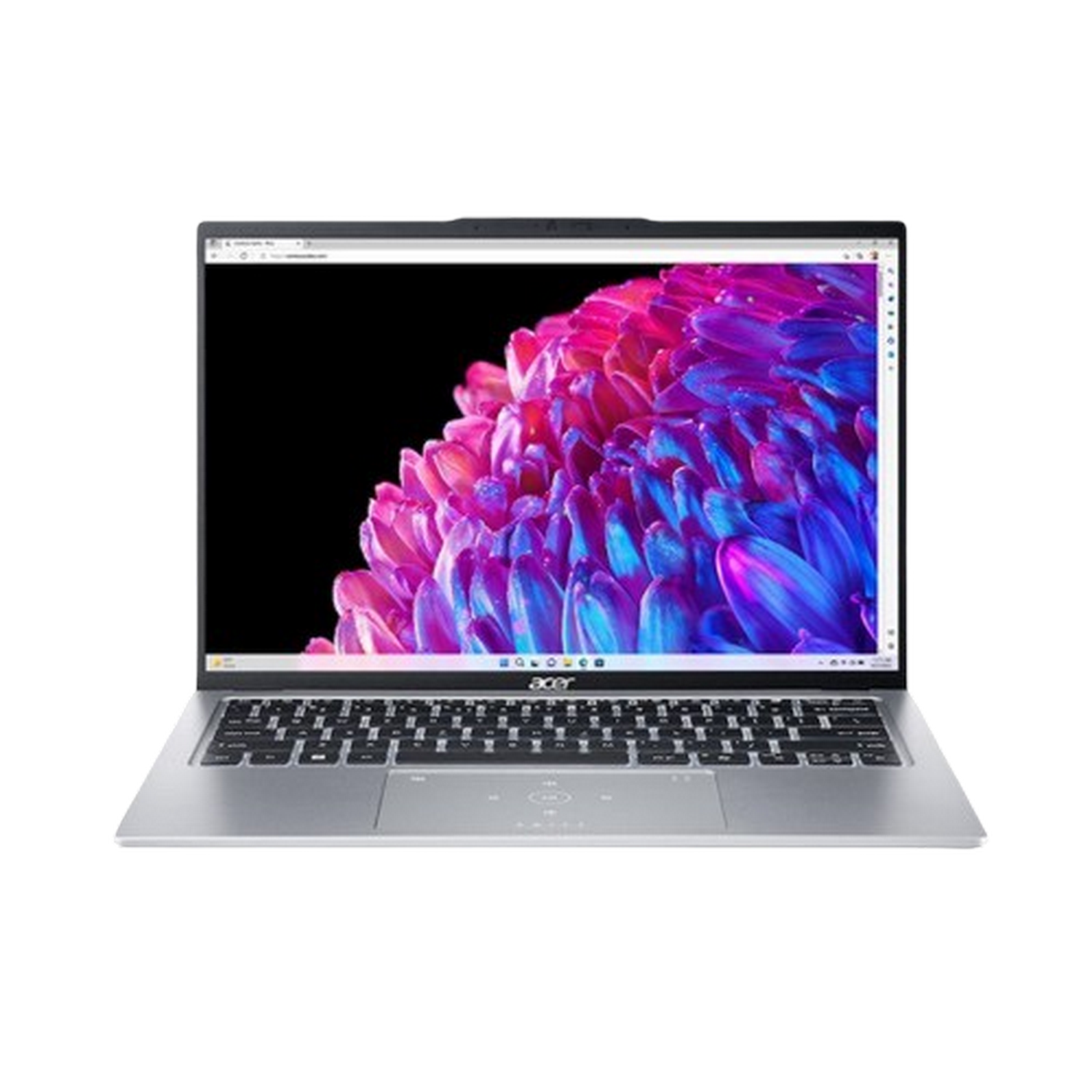 Portátil plateado con pantalla abstracta y colorida. Teclado y panel táctil negros visibles. El fondo es un degradado gris.