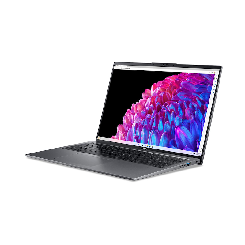 Una laptop Acer gris está abierta, mostrando una imagen abstracta colorida sobre un fondo negro. La laptop está sobre un fondo blanco.