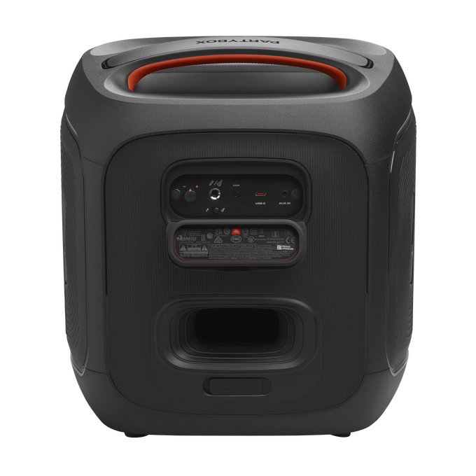 Altavoz JBL PartyBox negro. El asa superior es naranja. La parte trasera tiene puertos y un panel de control. Fondo gris.