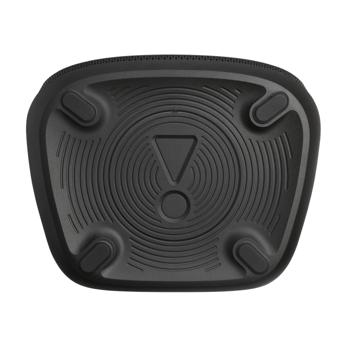 Parte inferior de altavoz negro. Cuenta con patas de goma, círculos concéntricos y el logotipo de JBL en el centro.