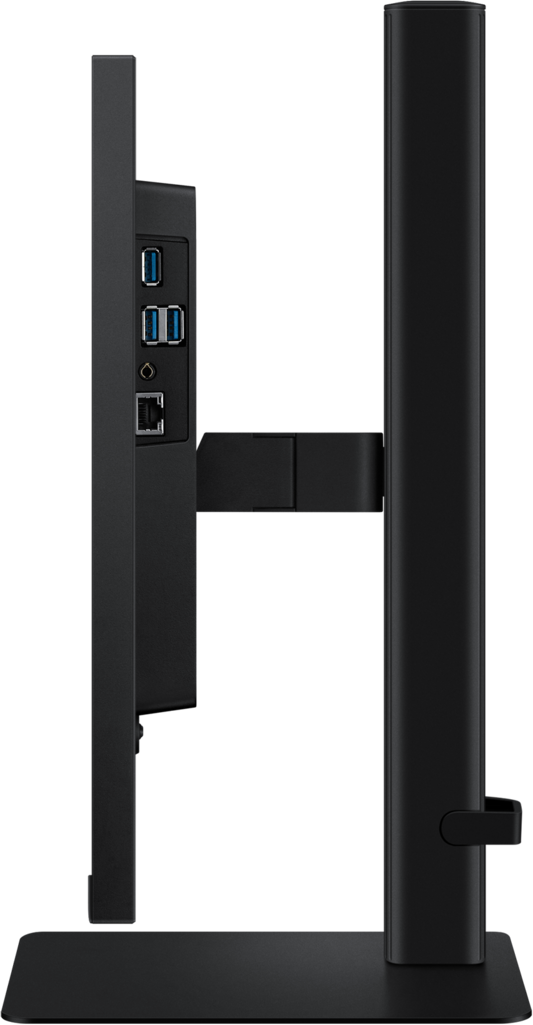 Vue latérale d'un écran d'ordinateur noir. Les ports visibles incluent USB, prise audio et Ethernet. Le support est également noir.