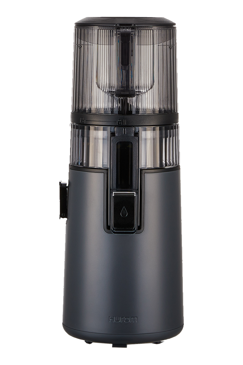 Un extracteur de jus gris foncé avec un dessus transparent. Design moderne avec un symbole de goutte d'eau visible.